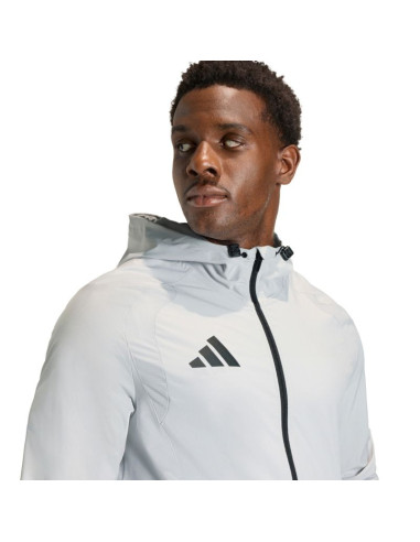 Kurtka męska adidas tiro 26 travel windbreaker jasnoszara kd3336